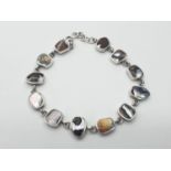 Silver bracelet stone set with mother of pearl and agate, boxed. 8 1/2 inches / 21cm approx