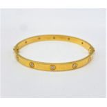 18ct gold BANGLE, marked as Cartier, approx 6mm wide estimated total diamond 0.70ct (G/H colour