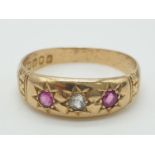 Antique 18ct gold gypsy ring having a diamond to centre with a ruby either side, clear hallmark
