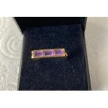 9ct Gold Ring having 3 Channel Set Baguette Amethysts in Trilogy Form. Quality piece of jewellery.