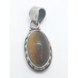 Silver pendant having stone set large tigers eye cabochon in oval form, 925 silver gift boxed
