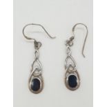 Pair of silver and black onyx DROP EARRINGS in Renee Mackintosh style with Celtic infuence. Marked