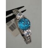 Silver ring with natural topaz and cz; weight 2.5G; size J1/2