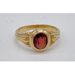 Antique 15ct gold and garnet ring with inscription in band dated 1866, weight 4.3g & size N