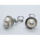 Pair of silver and pearl EARRINGS.