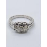 18ct white gold diamond cluster ring, weight 4.5g and 0.60ct diamonds approx size M