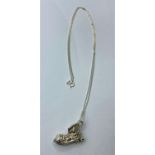 SILVER CHAIN AND BOOT PENDANT THAT OPENS, WEIGHT 8.5G