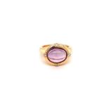 18ct gold ring, 1.5ct Amethyst oval capuchon with 0.10ct side diamonds (F/G colour, VS/SI clarity)