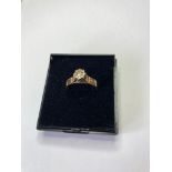 9ct gold ring having diamond to top in unusual cathedral mount setting. Hallmark for London 9ct