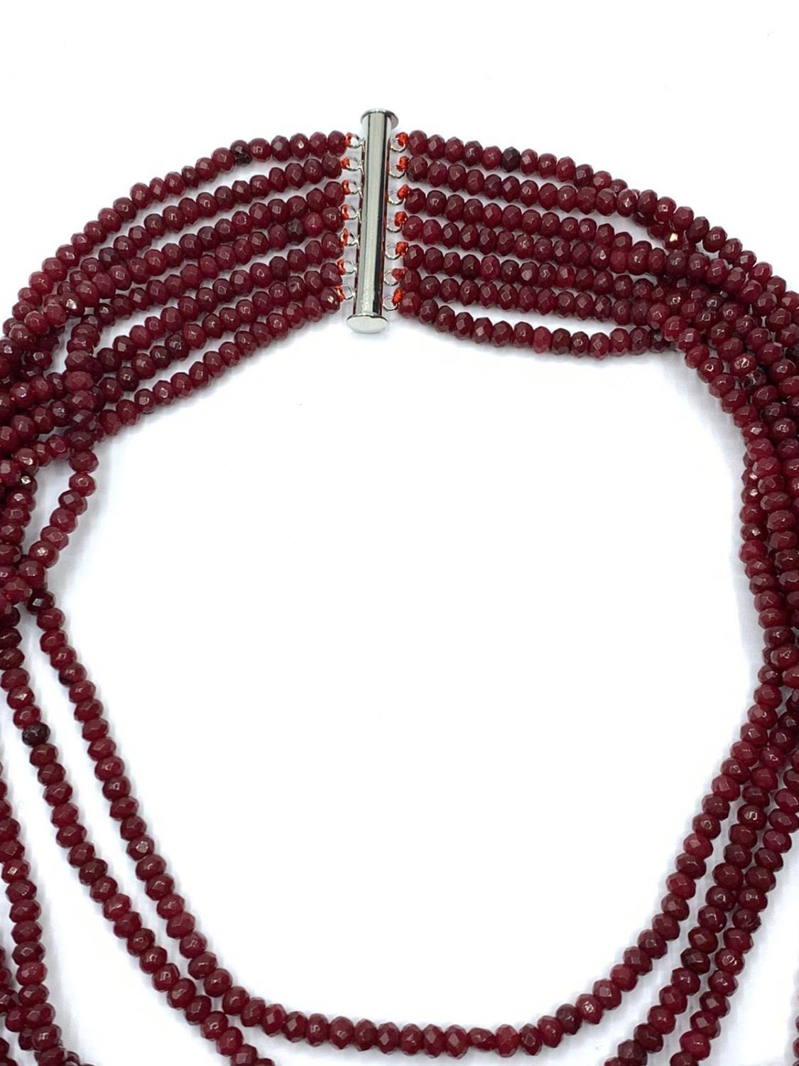 An impressive seven row multi-faceted ruby necklace, Length 44-60cm Weight: 106 g. Rubies are colour - Image 3 of 4