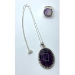 An Amethyst gemstone pendant with matching Amethyst ring in sterling silver, size M & length of