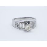 18CT DIAMOND RING WITH 0.40CT CENTRE STONE PLUS 1.30CT APPROX SHOULDER STONES (TOTAL 1.70CT), WEIGHT