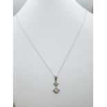 18ct Diamond PENDANT on 9ct chain. 1.6g 44cm