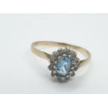 9CT Y/G BLUE AND WHITE STONE DRESS CLUSTER RING , WEIGHT 1.4G AND SIZE N1/2