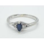 9ct white gold ring having marquise shaped sapphire to centre with diamond shoulders, full UK