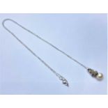 Small 18ct pearl PENDANT with 9ct (44cm) chain. 1.9g