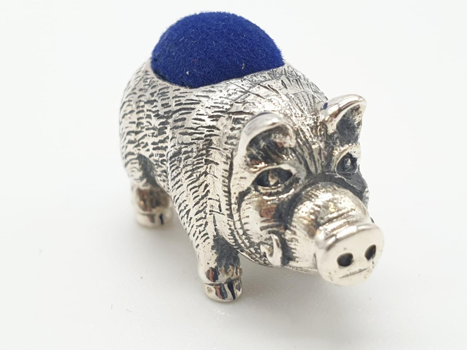 Silver pin cushion in the form of a pig or boar, 2.7cm approx
