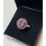 Vintage Silver Marcasite and Amethyst ring having oval amethyst to centre with marcasite cluster
