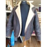 A well aged SHEEPSKIN AVIATOR'S JACKET. Size 42. Made by Lakeland.