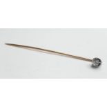 An antique diamond stick pin