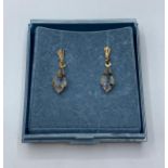 Pair of 9ct earrings with CZ stones