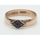 9ct gold RING having faceted garnet to top. Clear full UK Birmingham hallmark. Dainty and neat ring.