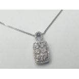 18CT W/G CHAIN AND FANCY DIAMOND CLUSTER PENDANT 0.80CT, WEIGHT 3.6G AND 46CM LONG APPROX