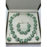 A 60?s style Murano handmade glass necklace, bracelet and earrings set in a presentation box.