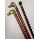 3 x wooden WALKING STICKS. 89cm. 2 with metal animal heads.