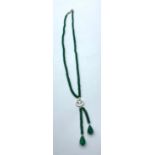 An emerald necklace in unique style with two emerald drops which flow below, 91cts, length 44cm