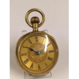 Antique large heavy gilt Goliath POCKET WATCH. 65mm case. It sets, winds and ticks but comes with no