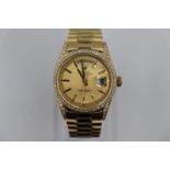 Rolex Daydate watch 1970s model with custom diamond shoulders and bezel, factory dial, come with box