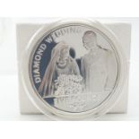 Silver FIVE POUND COIN. Minted in 2007 to celebrate the diamond wedding of Queen Elizabeth II to