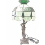 Tiffany style LAMP. Lady holding torch stem. Metal base.