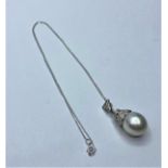 South Sea pearl PENDANT with Diamonds . 18ct chain. 7.6g 40cm