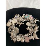 Silver Charm Bracelet absolutely full of silver charms to include Silver Heart Padlock, Celtic