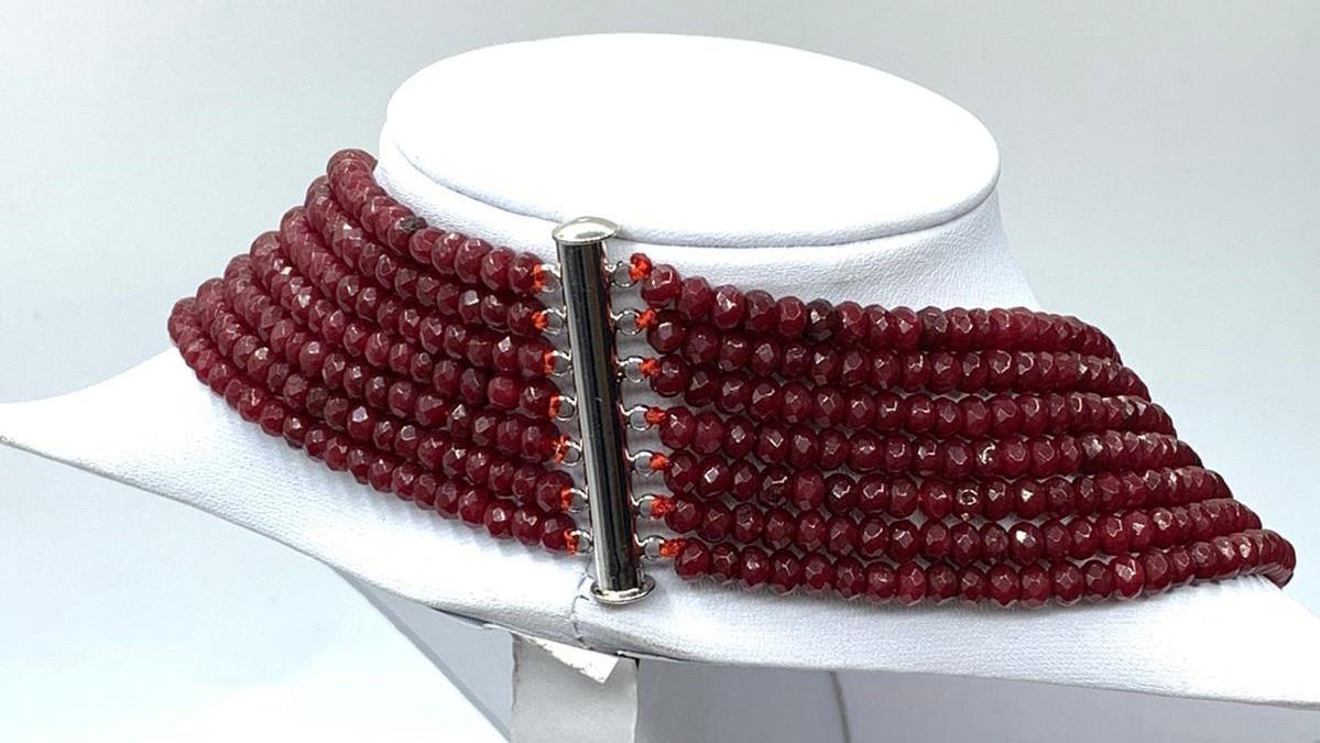 An impressive seven row multi-faceted ruby necklace, Length 44-60cm Weight: 106 g. Rubies are colour - Image 4 of 4