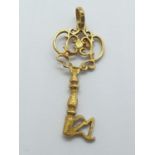 18ct key PENDANT / CHARM. 1.9g