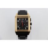 Jaeger le Coultre rose gold Watch, square face reverse skeleton back and black rubber strap, good