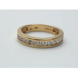 18ct yellow gold diamond set 1/2 eternity ring, weight 3.9g and 0.60ct approx SIZE O