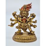A very early Oriental gilt on bronze statue of a fertility god, weight 2.25kg and 19cm tall approx