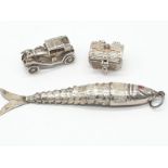 3x assorted large silver pendant, total weight 24.41g. Fish pendant 8cm long, treasure trunk opens