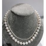 Set of 2 freshwater pearl necklaces to include: one big necklace (over 19inches long) with