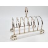 White Metal Toast Rack with Elephant Feet Stand. Weight: 267g. Length:16cm