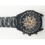 Gentleman's ESS Skeleton chronograph type wristwatch automatic having black bezel and white