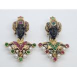 A pair of Ebony Turban wearing brooches decorated in large amounts of emeralds, rubies and pearls