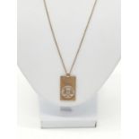 9ct gold rectangular scaled pendant on a 9ct gold 50cm chain, weight 3.5g