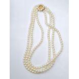 3 rows of cultured pearls choker necklace set in 9ct gold clasp, weight 45g and 33cm long approx