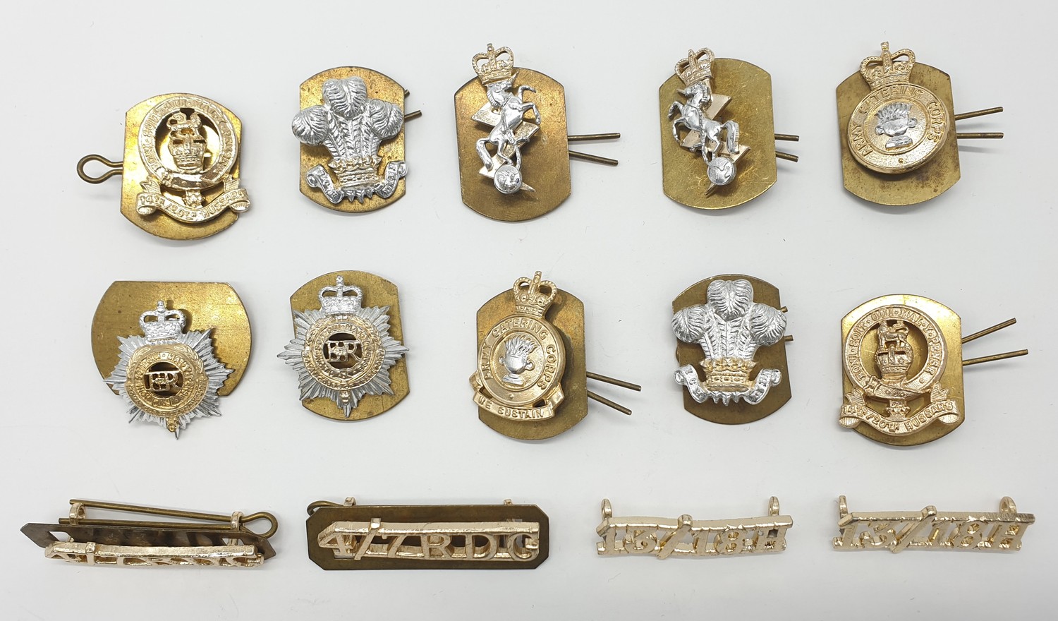 Military selection of shoulder titles and collar badges to include Royal dragon guards and Hussars