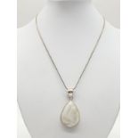 Large moonstone pendant on 40cm long silver chain, weight 17.77g and stone size 35x24mm approx